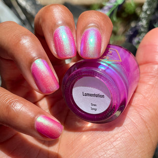 Image provided for Bee's Knees by a paid swatcher featuring the nail polish " Lamentation "
