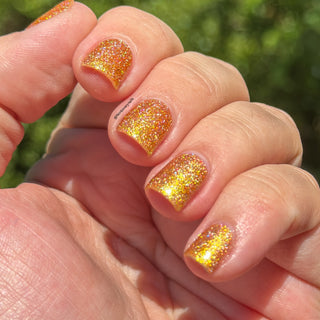 Image provided for Bee's Knees by a paid swatcher featuring the nail polish " The Golden Path "