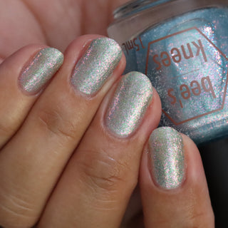 Image provided for Bee's Knees by a paid swatcher featuring the nail polish " Heartbreak "
