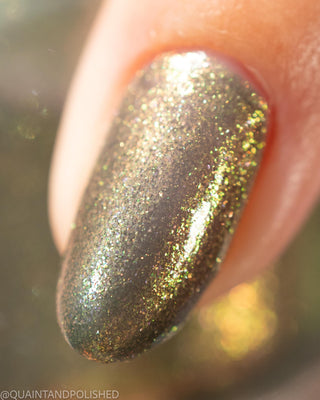 Image provided for Bee's Knees by a paid swatcher featuring the nail polish " Denial "