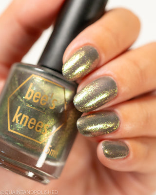 Image provided for Bee's Knees by a paid swatcher featuring the nail polish " Denial "