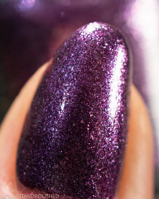 Image provided for Bee's Knees by a paid swatcher featuring the nail polish " Nevermore "