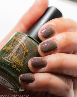 Image provided for Bee's Knees by a paid swatcher featuring the nail polish " Boil Beetle Venom "