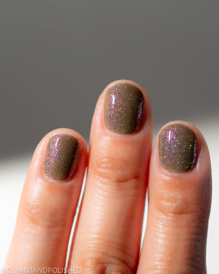 Image provided for Bee's Knees by a paid swatcher featuring the nail polish " Boil Beetle Venom "