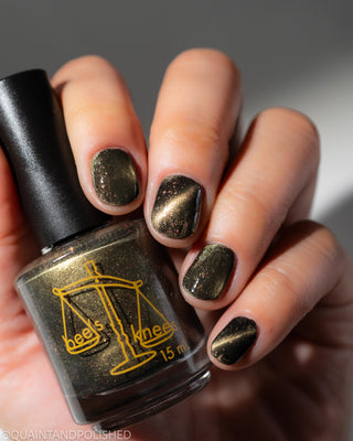 Image provided for Bee's Knees by a paid swatcher featuring the nail polish " Stormfall "