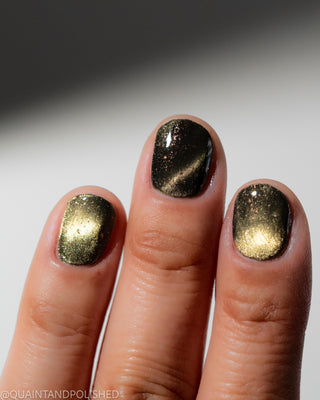 Image provided for Bee's Knees by a paid swatcher featuring the nail polish " Stormfall "