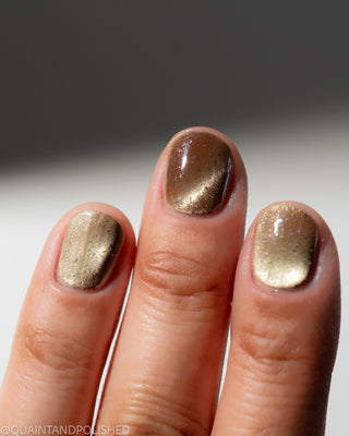 Image provided for Bee's Knees by a paid swatcher featuring the nail polish " Violentia nervus potestas "