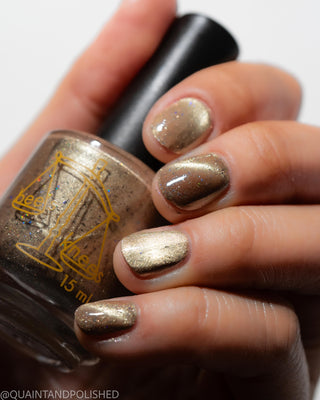 Image provided for Bee's Knees by a paid swatcher featuring the nail polish " Violentia nervus potestas "