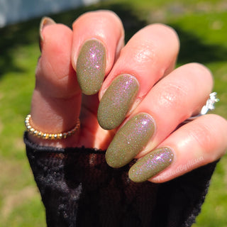 Image provided for Bee's Knees by a paid swatcher featuring the nail polish " Boil Beetle Venom "