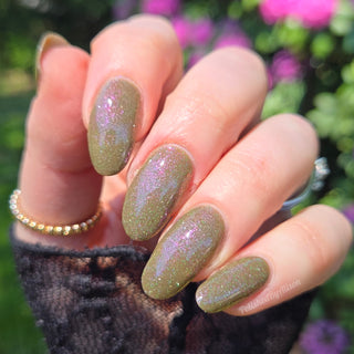 Image provided for Bee's Knees by a paid swatcher featuring the nail polish " Boil Beetle Venom "