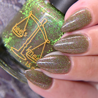 Image provided for Bee's Knees by a paid swatcher featuring the nail polish " Boil Beetle Venom "