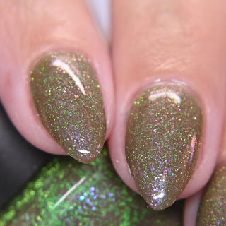 Image provided for Bee's Knees by a paid swatcher featuring the nail polish " Boil Beetle Venom "