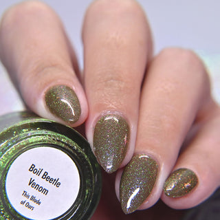 Image provided for Bee's Knees by a paid swatcher featuring the nail polish " Boil Beetle Venom "