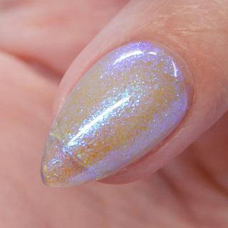 Image provided for Bee's Knees by a paid swatcher featuring the nail polish " Youth "