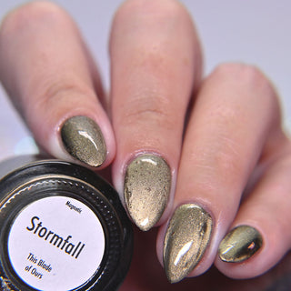 Image provided for Bee's Knees by a paid swatcher featuring the nail polish " Stormfall "