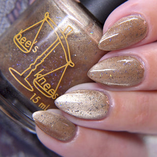 Image provided for Bee's Knees by a paid swatcher featuring the nail polish " Violentia nervus potestas "