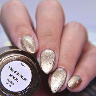 Image provided for Bee's Knees by a paid swatcher featuring the nail polish " Violentia nervus potestas "