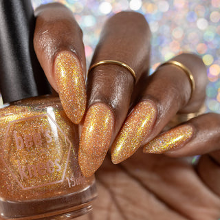 Image provided for Bee's Knees by a paid swatcher featuring the nail polish " The Golden Path "
