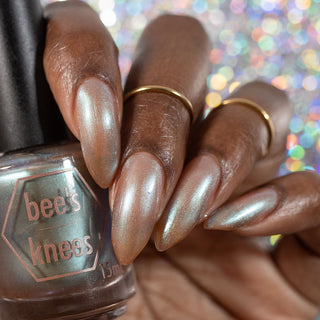 Image provided for Bee's Knees by a paid swatcher featuring the nail polish " Torrent "