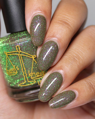 Image provided for Bee's Knees by a paid swatcher featuring the nail polish " Boil Beetle Venom "