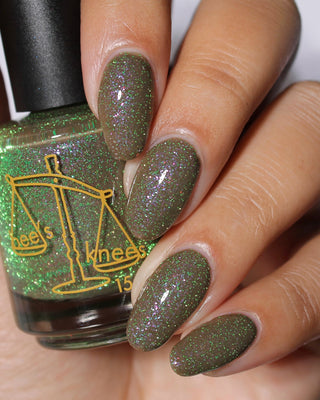 Image provided for Bee's Knees by a paid swatcher featuring the nail polish " Boil Beetle Venom "