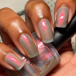 Image provided for Bee's Knees by a paid swatcher featuring the nail polish " Praise the Dog "