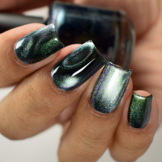 Image provided for Bee's Knees by a paid swatcher featuring the nail polish " Midnight Yoga and Seaweed "