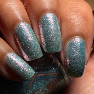 Image provided for Bee's Knees by a paid swatcher featuring the nail polish " Heartbreak "