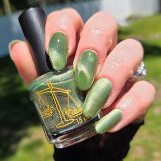 Image provided for Bee's Knees by a paid swatcher featuring the nail polish " Coercer "