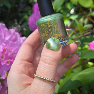 Image provided for Bee's Knees by a paid swatcher featuring the nail polish " Coercer "