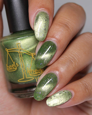 Image provided for Bee's Knees by a paid swatcher featuring the nail polish " Coercer "
