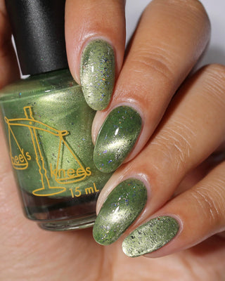 Image provided for Bee's Knees by a paid swatcher featuring the nail polish " Coercer "