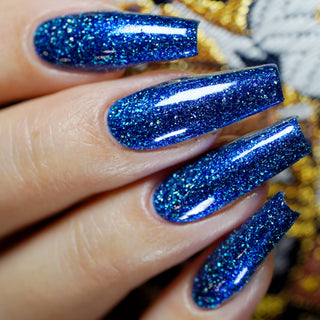 Image provided for Bee's Knees by a paid swatcher featuring the nail polish " Game Playing Deviant "