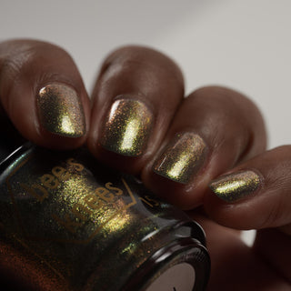 Image provided for Bee's Knees by a paid swatcher featuring the nail polish " Denial "