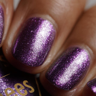 Image provided for Bee's Knees by a paid swatcher featuring the nail polish " Nevermore "