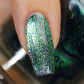 Image provided for Bee's Knees by a paid swatcher featuring the nail polish " Midnight Yoga and Seaweed "