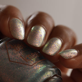 Image provided for Bee's Knees by a paid swatcher featuring the nail polish " Heartbreak "