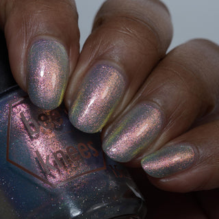 Image provided for Bee's Knees by a paid swatcher featuring the nail polish " The Archer's Curse "