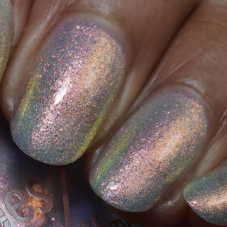 Image provided for Bee's Knees by a paid swatcher featuring the nail polish " The Archer's Curse "