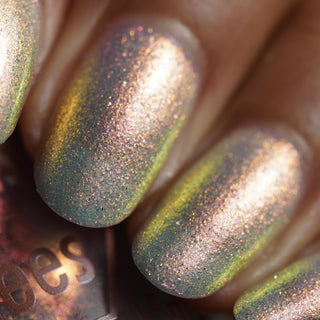 Image provided for Bee's Knees by a paid swatcher featuring the nail polish " The Archer's Curse "