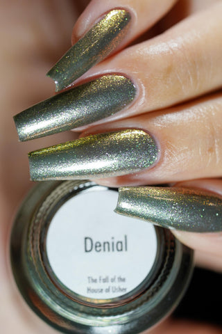 Image provided for Bee's Knees by a paid swatcher featuring the nail polish " Denial "