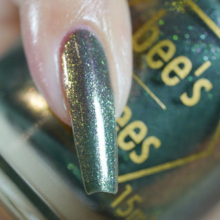 Image provided for Bee's Knees by a paid swatcher featuring the nail polish " Denial "