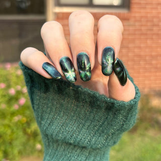 Image provided for Bee's Knees by a paid swatcher featuring the nail polish " Midnight Yoga and Seaweed "