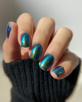 Image provided for Bee's Knees by a paid swatcher featuring the nail polish " The Pond Spirit "
