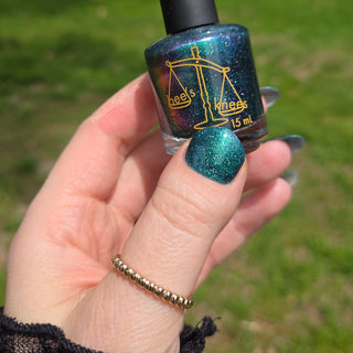 Image provided for Bee's Knees by a paid swatcher featuring the nail polish " Faragathe "