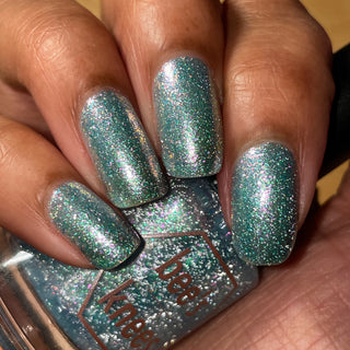 Image provided for Bee's Knees by a paid swatcher featuring the nail polish " Heartbreak "