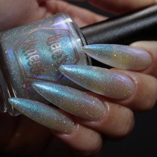 Image provided for Bee's Knees by a paid swatcher featuring the nail polish " Poisoned Fairy Fruit "