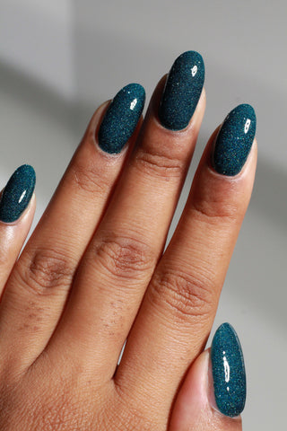 Image provided for Bee's Knees by a paid swatcher featuring the nail polish " From the Depths "