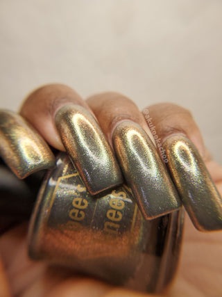 Image provided for Bee's Knees by a paid swatcher featuring the nail polish " Denial "