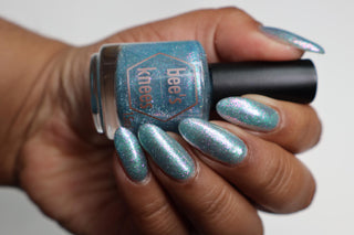 Image provided for Bee's Knees by a paid swatcher featuring the nail polish " Heartbreak "